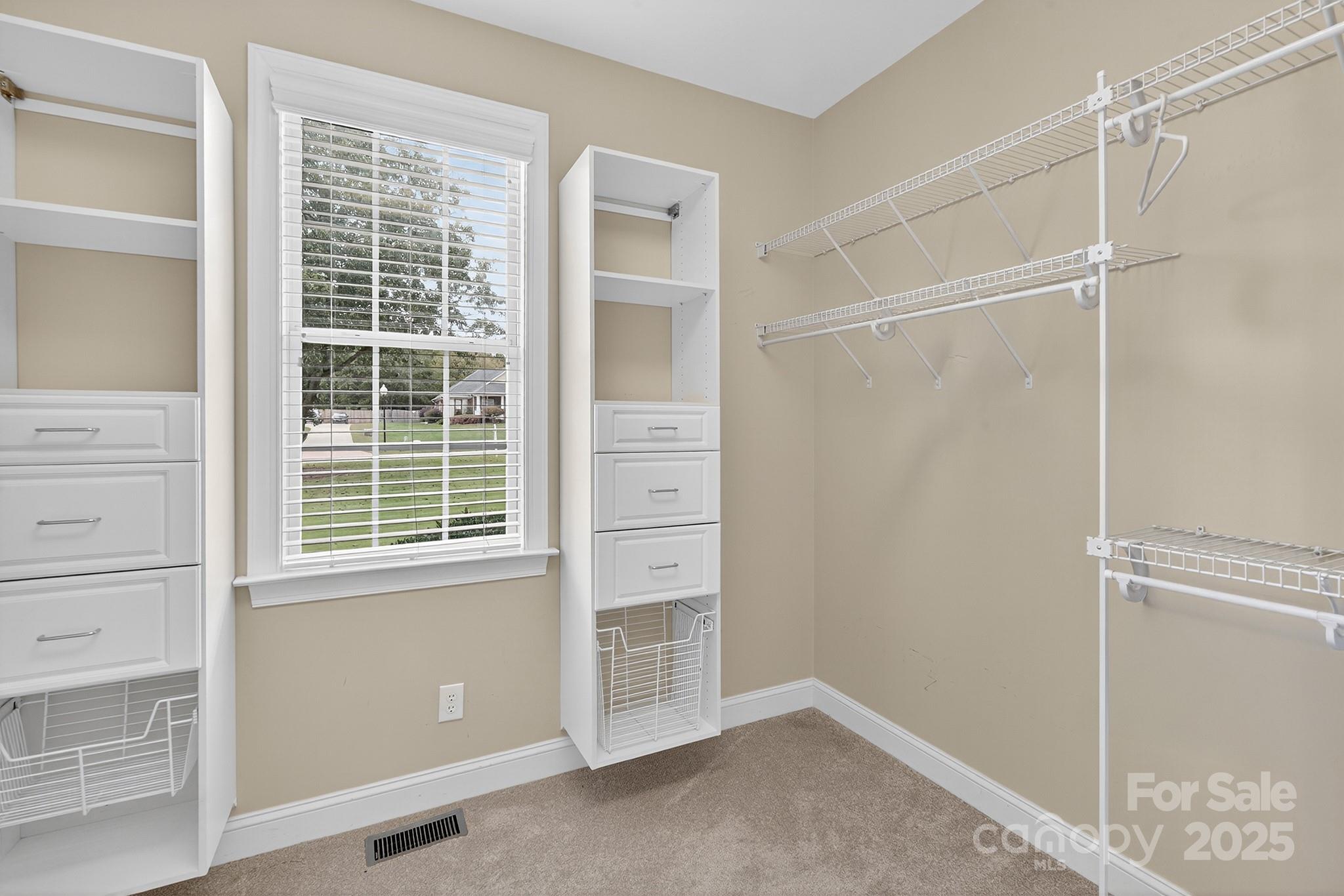 1912 Windmere Drive Monroe, NC 28110 - Photo 22 of 37 a view of an empty room with a window