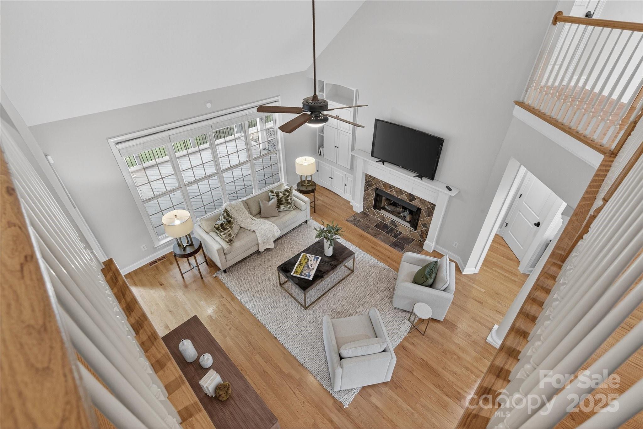 1912 Windmere Drive Monroe, NC 28110 - Photo 23 of 37 a living room with furniture and a flat screen tv