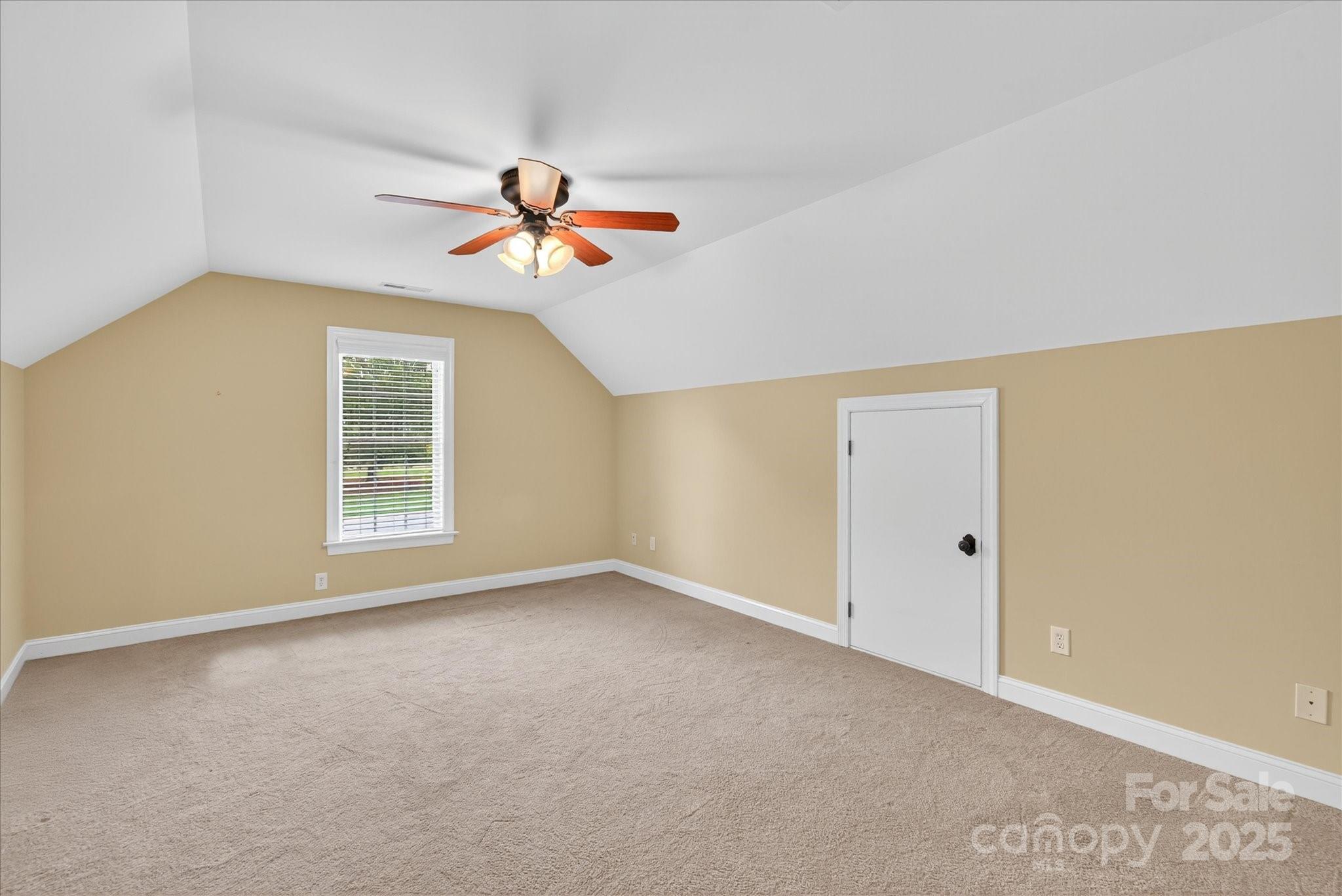 1912 Windmere Drive Monroe, NC 28110 - Photo 29 of 37 a view of a room with a ceiling fan and a window