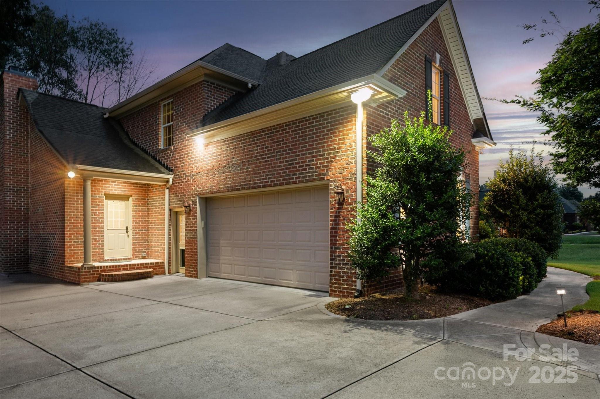 1912 Windmere Drive Monroe, NC 28110 - Photo 35 of 37 a view of a house with a yard and garage