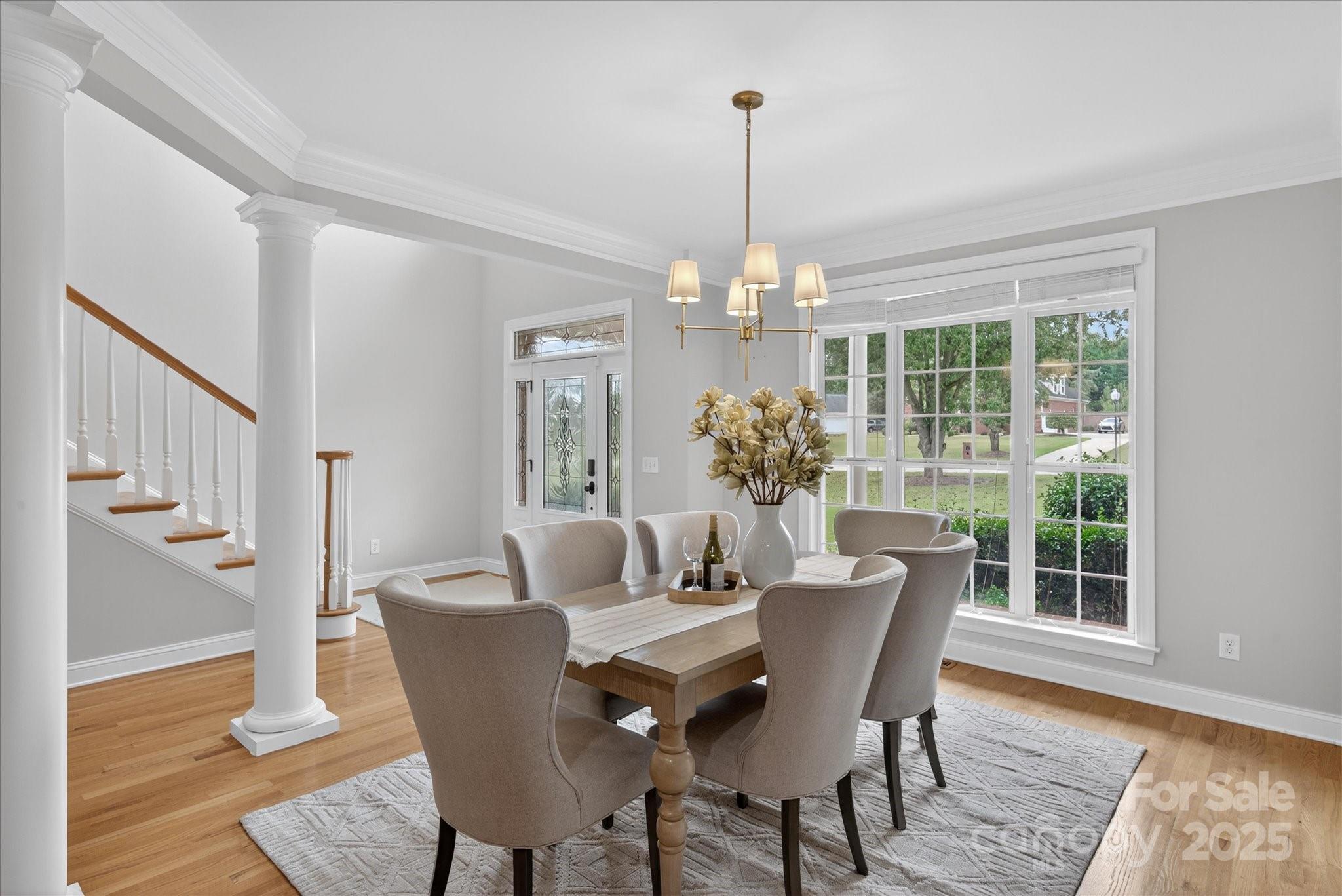 1912 Windmere Drive Monroe, NC 28110 - Photo 4 of 37 a view of a dining room with furniture window and wooden floor
