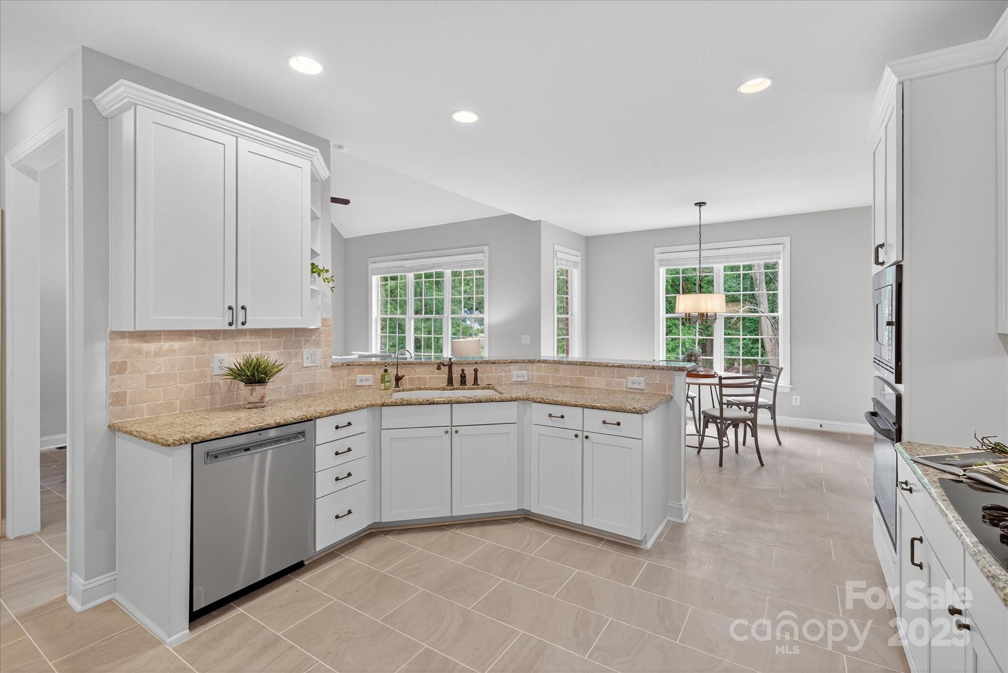 1912 Windmere Drive Monroe, NC 28110 - Photo 8 of 37 a kitchen with sink and cabinets
