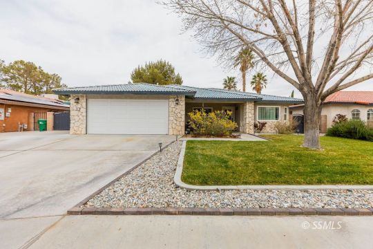 908 North Inyo Street Ridgecrest, CA 93555 - Photo 1 of 46 front view of a house with a yard