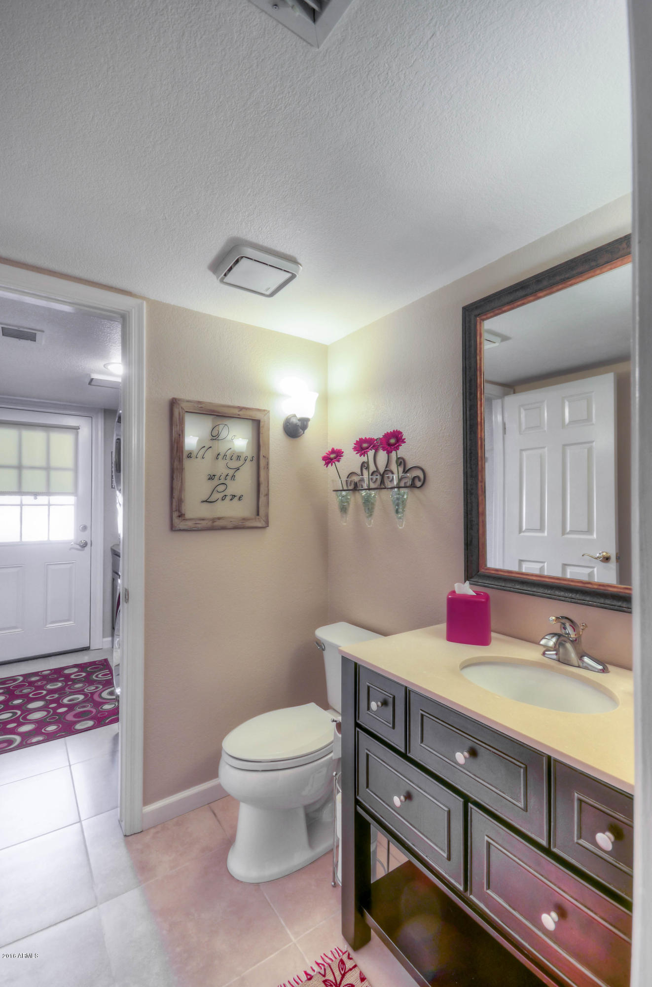 1433 North Woodside Road Chandler, AZ 85224 - Photo 32 of 70 a bathroom with a sink vanity mirror and toilet