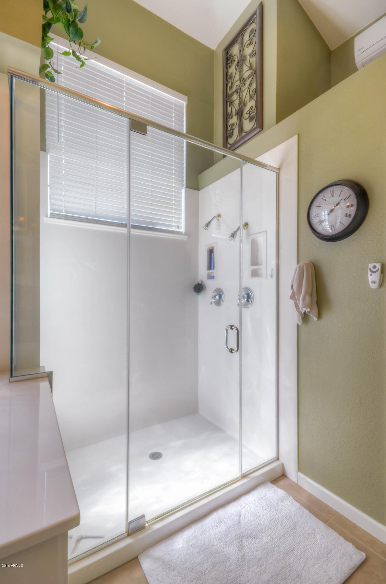 1433 North Woodside Road Chandler, AZ 85224 - Photo 40 of 70 a bathroom with a glass shower door