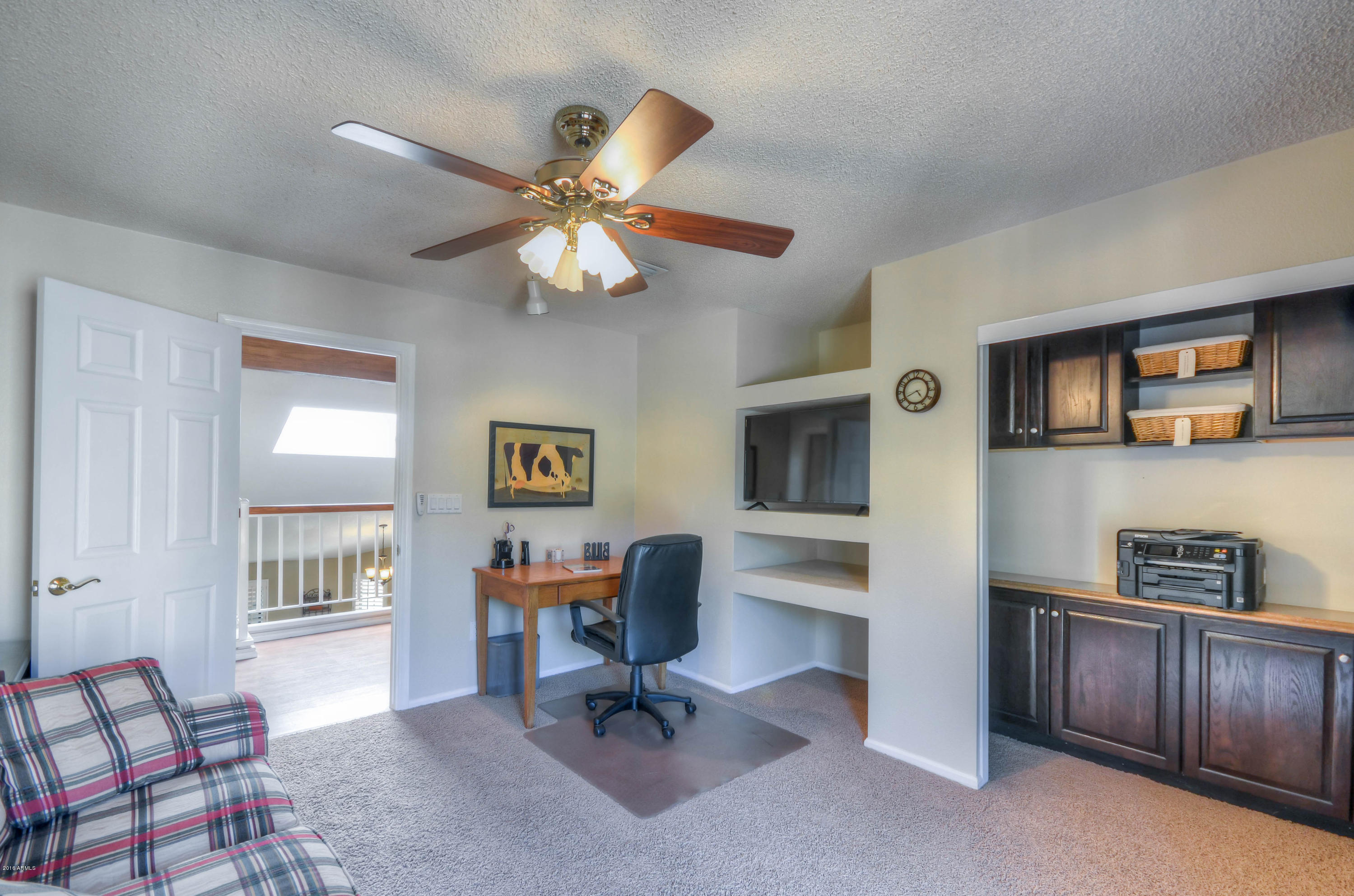 1433 North Woodside Road Chandler, AZ 85224 - Photo 50 of 70 a view of a livingroom with workspace and a window