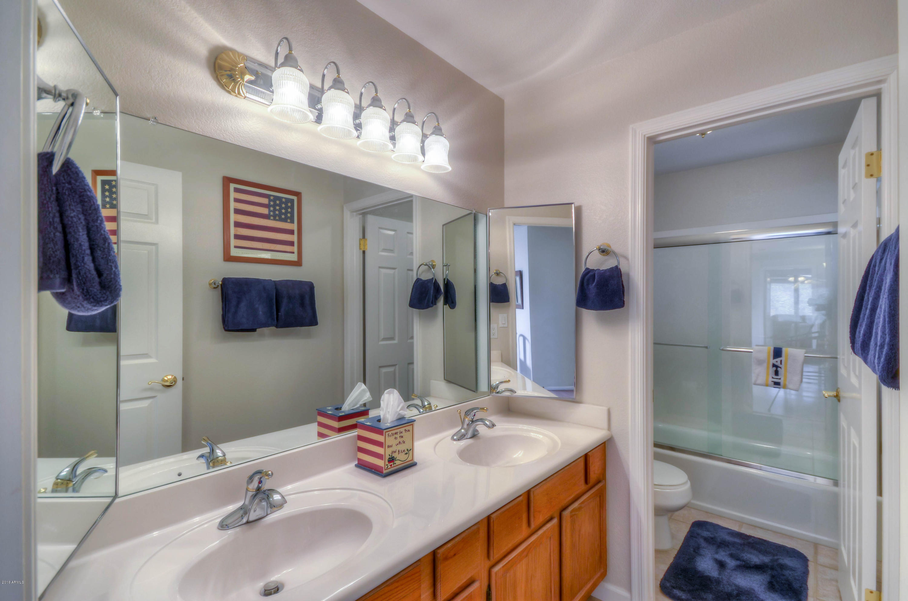 1433 North Woodside Road Chandler, AZ 85224 - Photo 53 of 70 a bathroom with a sink double vanity granite tub and shower
