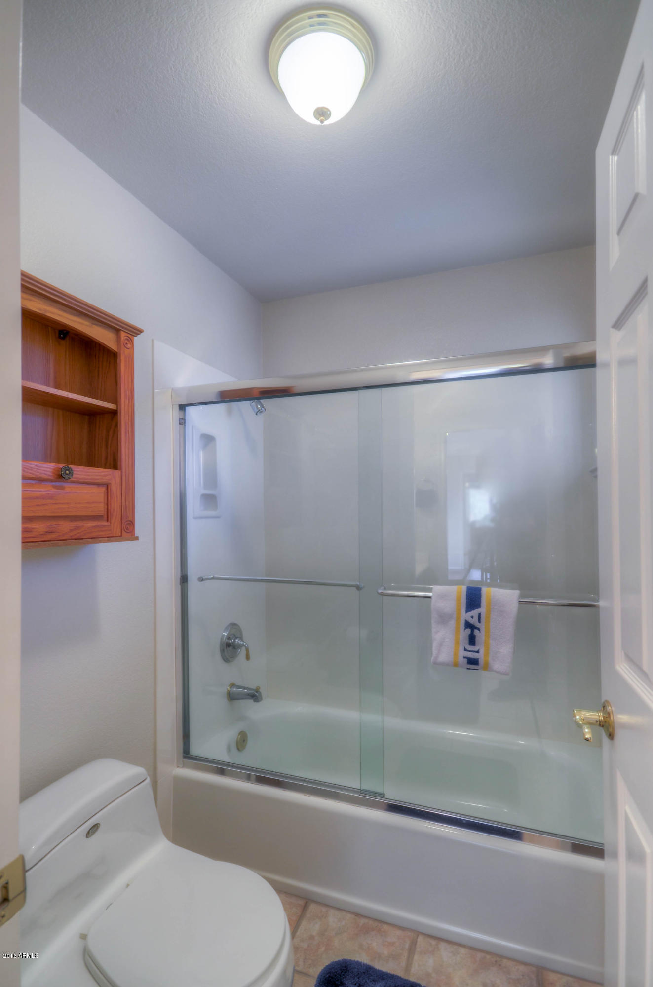 1433 North Woodside Road Chandler, AZ 85224 - Photo 55 of 70 a bathroom with a toilet and a shower