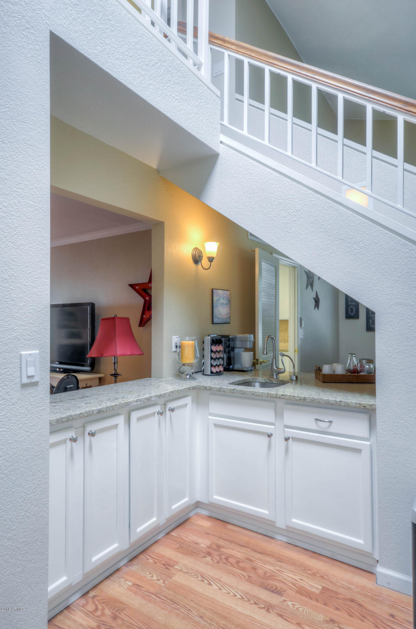 1433 North Woodside Road Chandler, AZ 85224 - Photo 7 of 70 a kitchen with stainless steel appliances granite countertop a sink and cabinets