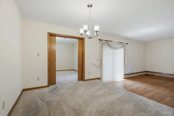 a kitchen with a sink cabinets and a refrigerator