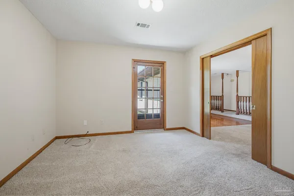 an empty room with windows