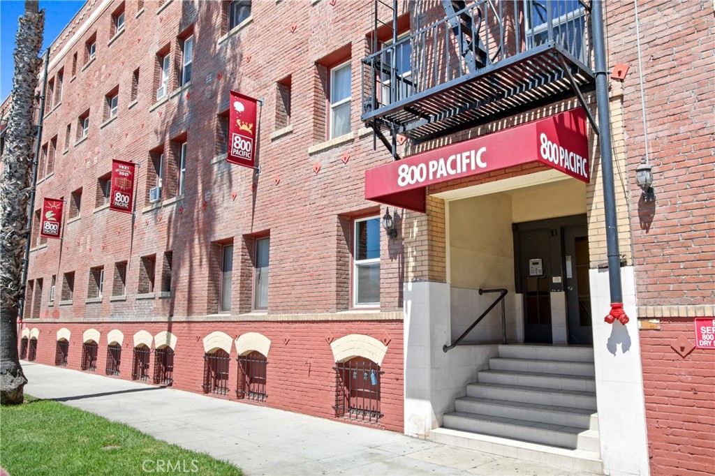 800 Pacific Avenue, Unit 301 Long Beach, CA 90813 - Photo 1 of 2 a view of a building with a lot of windows