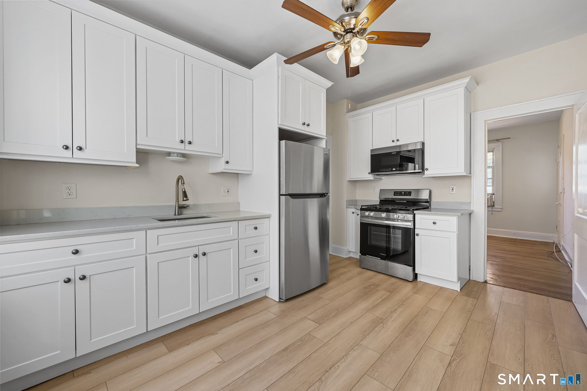 109 Post Road, Unit A Fairfield, CT 06824 - Photo 2 of 13 Recently renovated kitchen