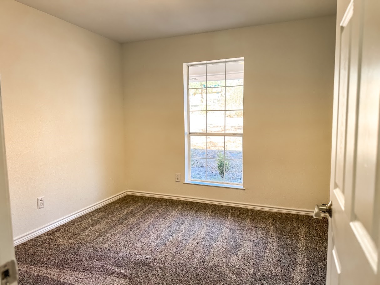 2010 Salt Works Road Palestine, TX 75803 - Photo 14 of 23 an empty room with a window