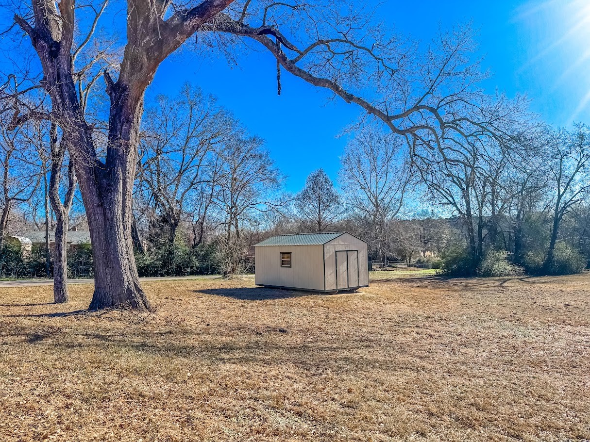2010 Salt Works Road Palestine, TX 75803 - Photo 21 of 23 a house that has a tree in front of it