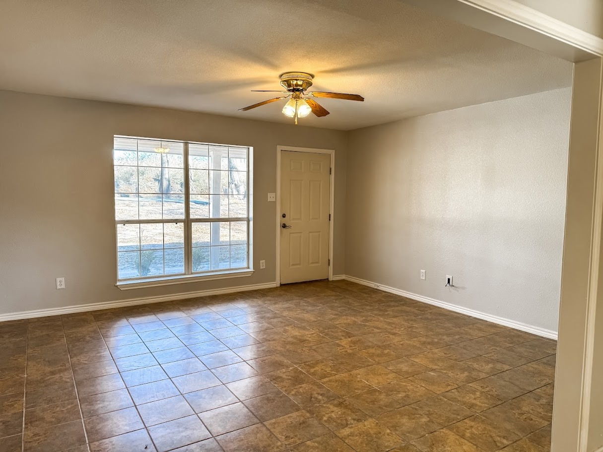 2010 Salt Works Road Palestine, TX 75803 - Photo 3 of 23 a view of an empty room with a window