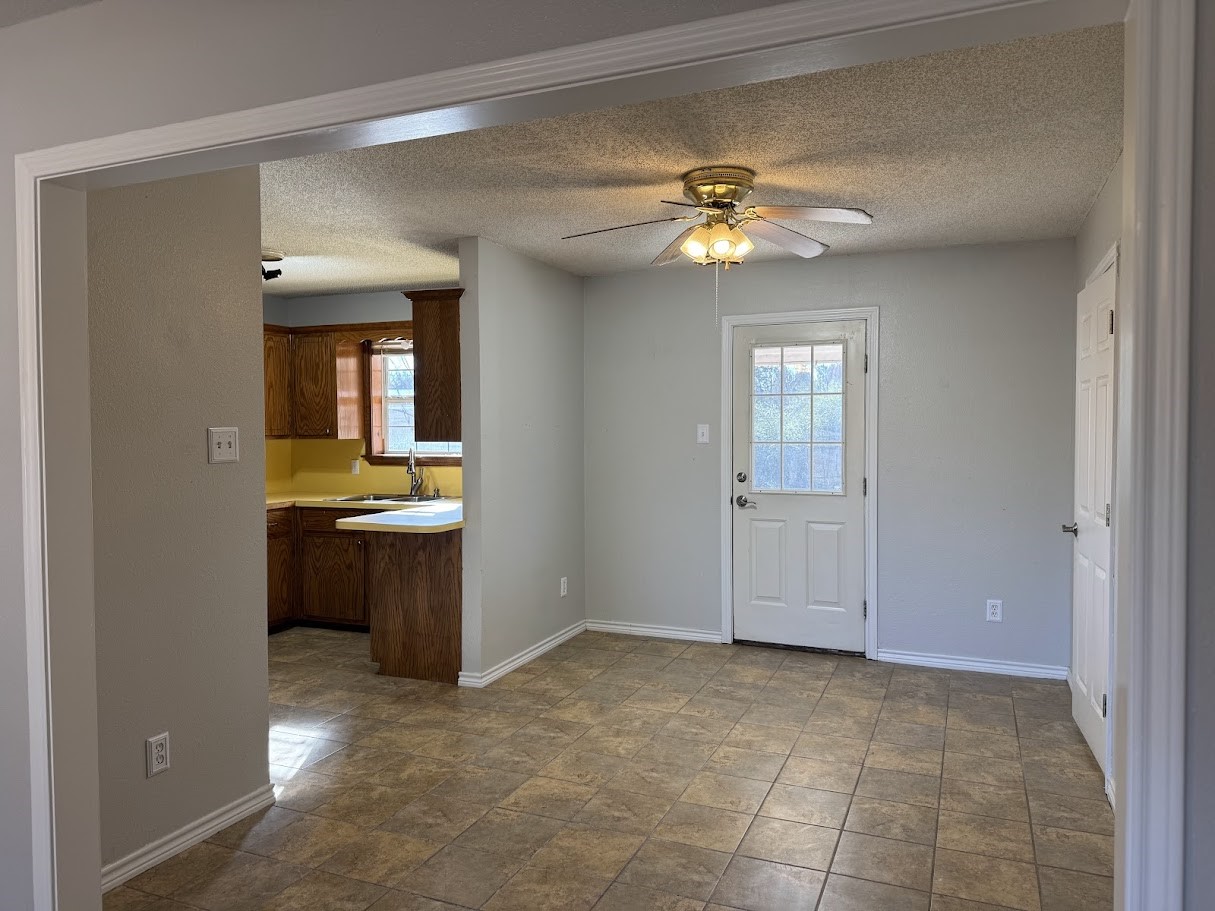 2010 Salt Works Road Palestine, TX 75803 - Photo 4 of 23 a view of an empty room with a bathroom