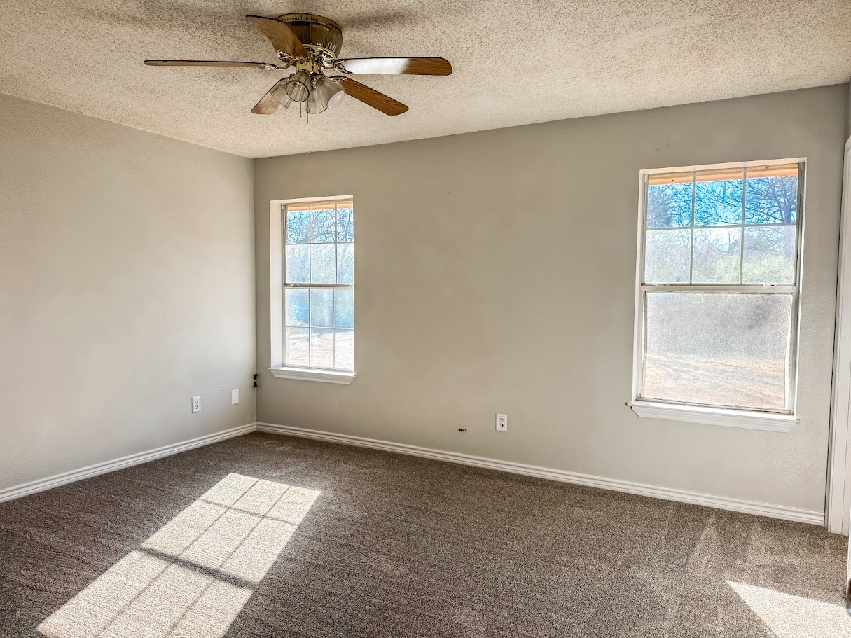 2010 Salt Works Road Palestine, TX 75803 - Photo 9 of 23 a view of an empty room with a window