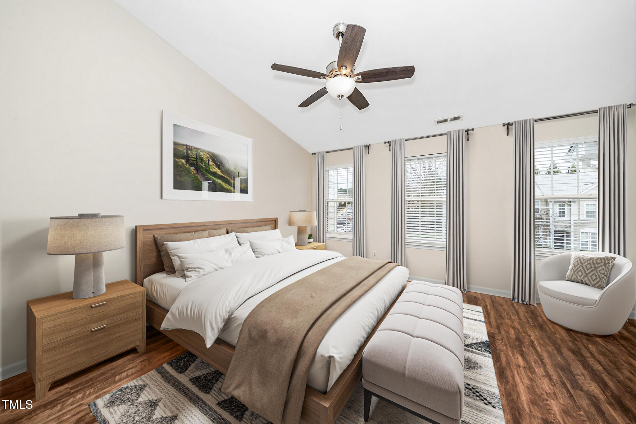 7753 Winners Edge Street Raleigh, NC 27617 - Photo 22 of 46 a bedroom with a bed and furniture