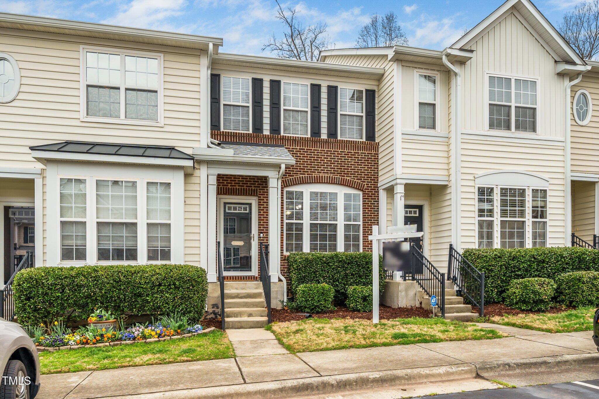 7753 Winners Edge Street Raleigh, NC 27617 - Photo 2 of 46 front view of a brick house