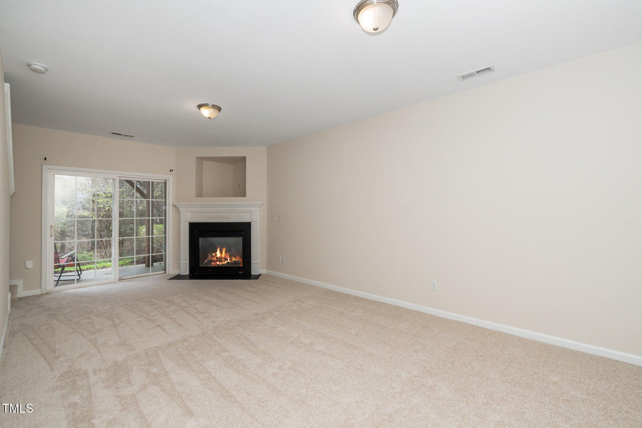 7753 Winners Edge Street Raleigh, NC 27617 - Photo 35 of 46 a view of an empty room with a window