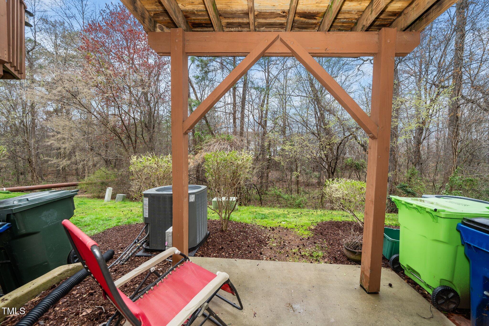 7753 Winners Edge Street Raleigh, NC 27617 - Photo 40 of 46 a view of backyard with green space