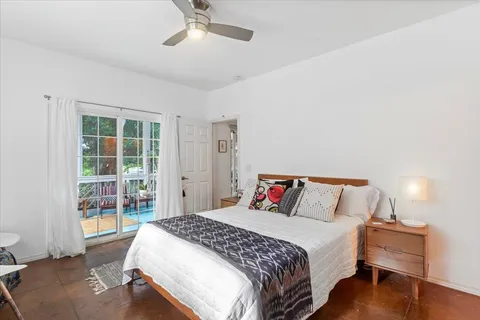 a kitchen with stainless steel appliances a stove microwave and refrigerator