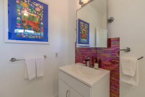 a bedroom with a bed and a table