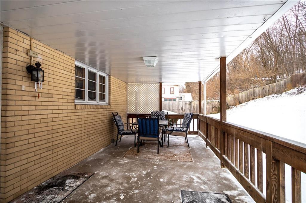 627 Virginia Avenue Rochester, PA 15074 - Photo 16 of 17 Nice back deck off kitchen for relaxing on the spring days that are right around the corner!