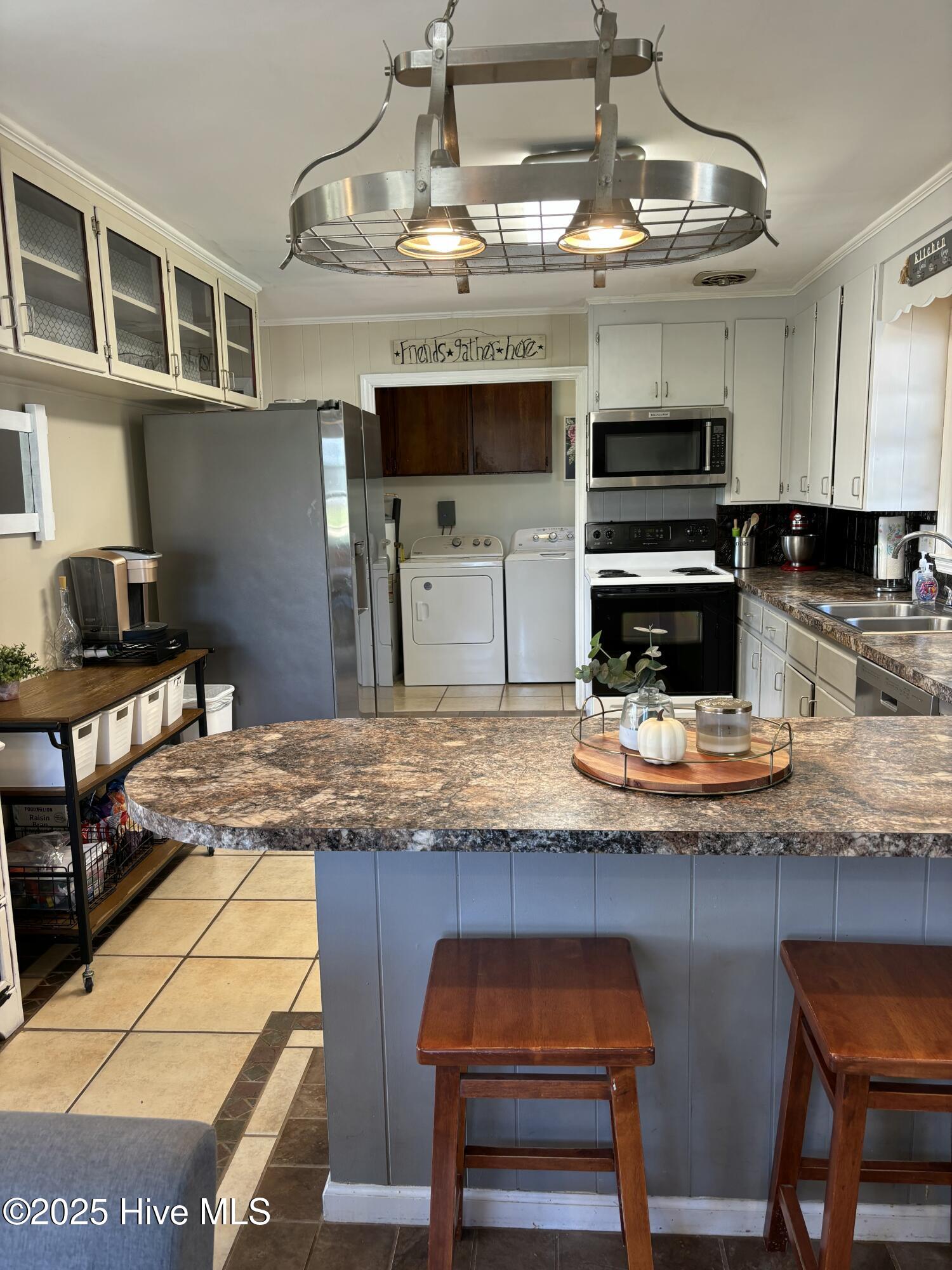 613 Doolittle Mill Road Conway, NC 27820 - Photo 15 of 63 View from living room to kitchen