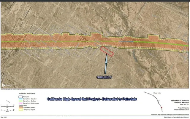 a black and white photo of a small pool