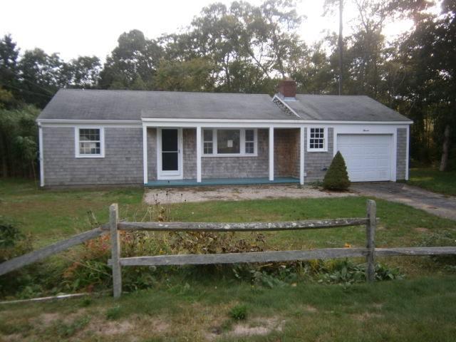 11 Shannon Road Harwich, MA 02645 - Photo 8 of 8 a front view of a house with a garden