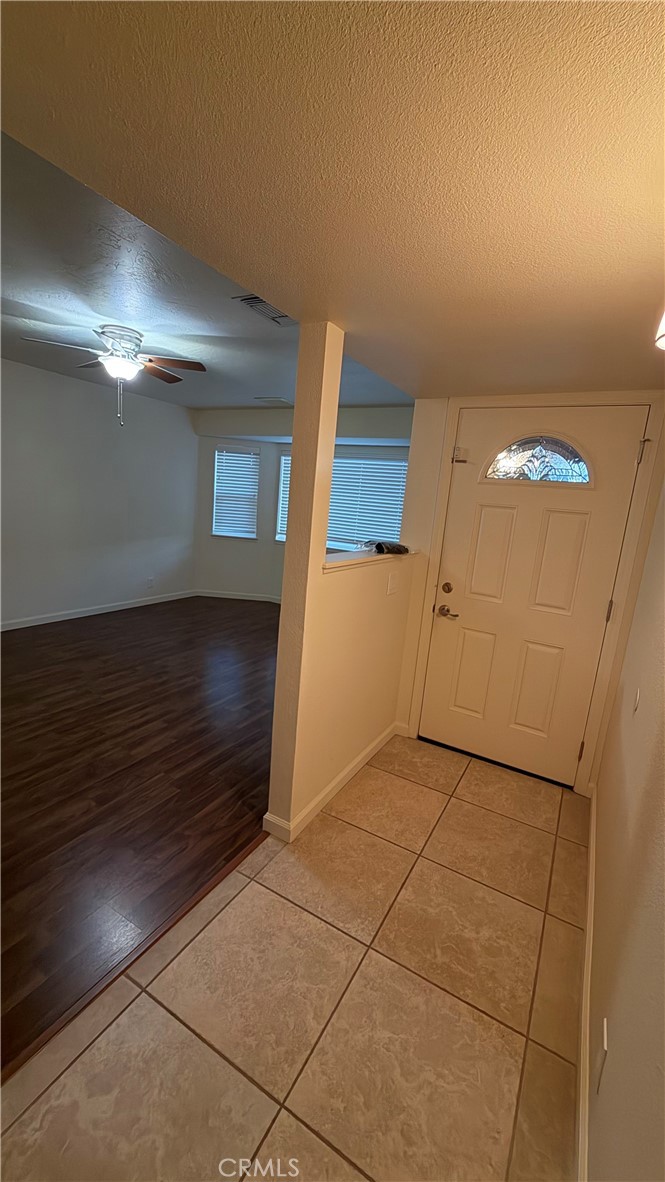 209 Kimberly Lane Ridgecrest, CA 93555 - Photo 14 of 62 a view of empty room with wooden floor
