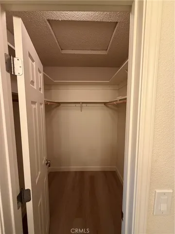 a view of room with walk in closet