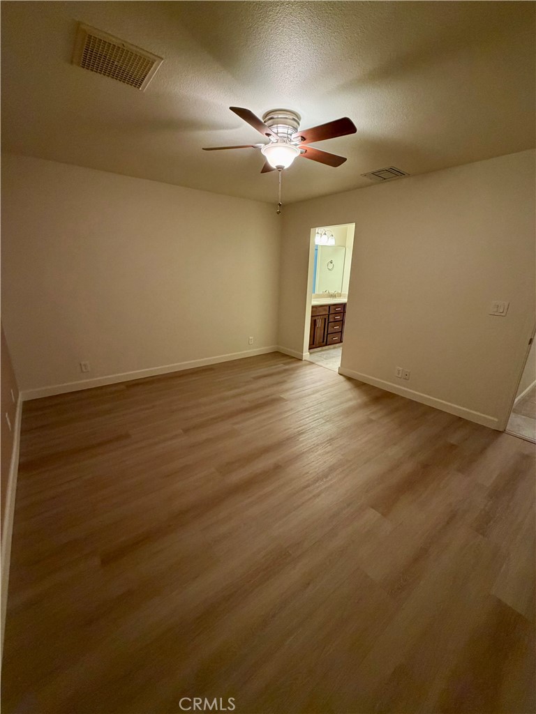209 Kimberly Lane Ridgecrest, CA 93555 - Photo 53 of 62 a view of an empty room with a window