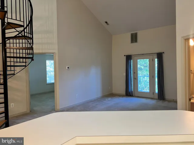 a bathroom with a sink a mirror and a shower