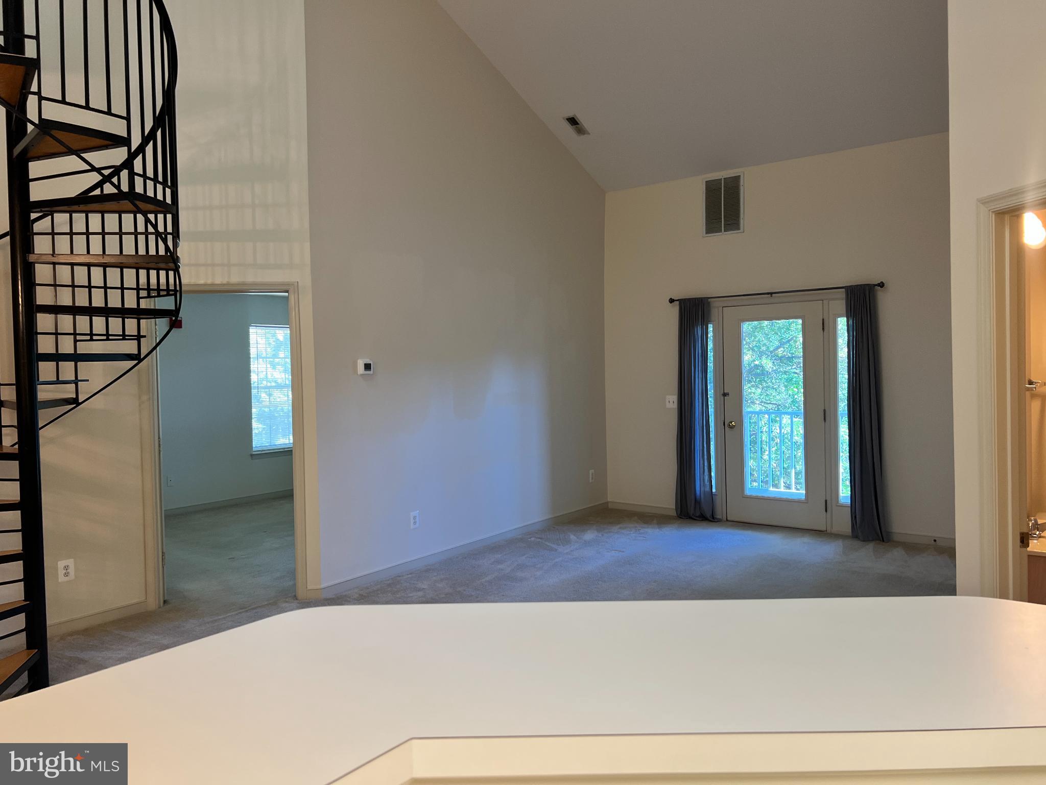 805 Latchmere Court, Unit 302 Annapolis, MD 21401 - Photo 12 of 14 a view of a hallway with entryway wooden floor and front door