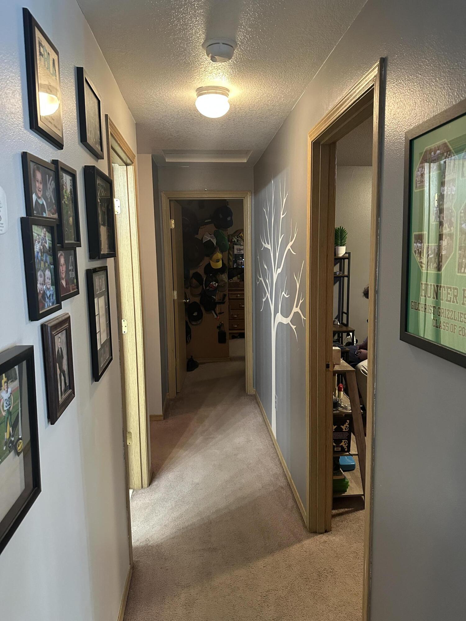123977 Surveyor Road Crescent Lake, OR 97733 - Photo 26 of 41 a view of a hallway with closet and a livingroom view