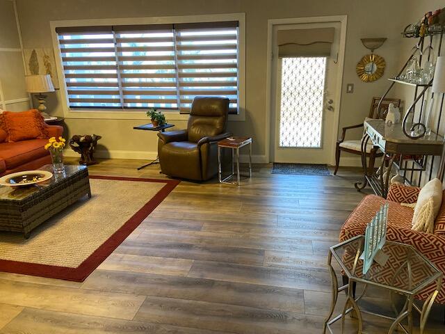 4029 Cornwall East Boca Raton, FL 33434 - Photo 2 of 20 a living room with furniture and a large window