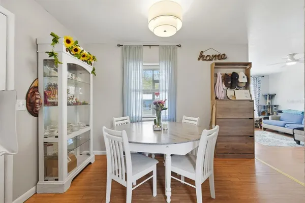 a living room with baby crib furniture and a baby crib