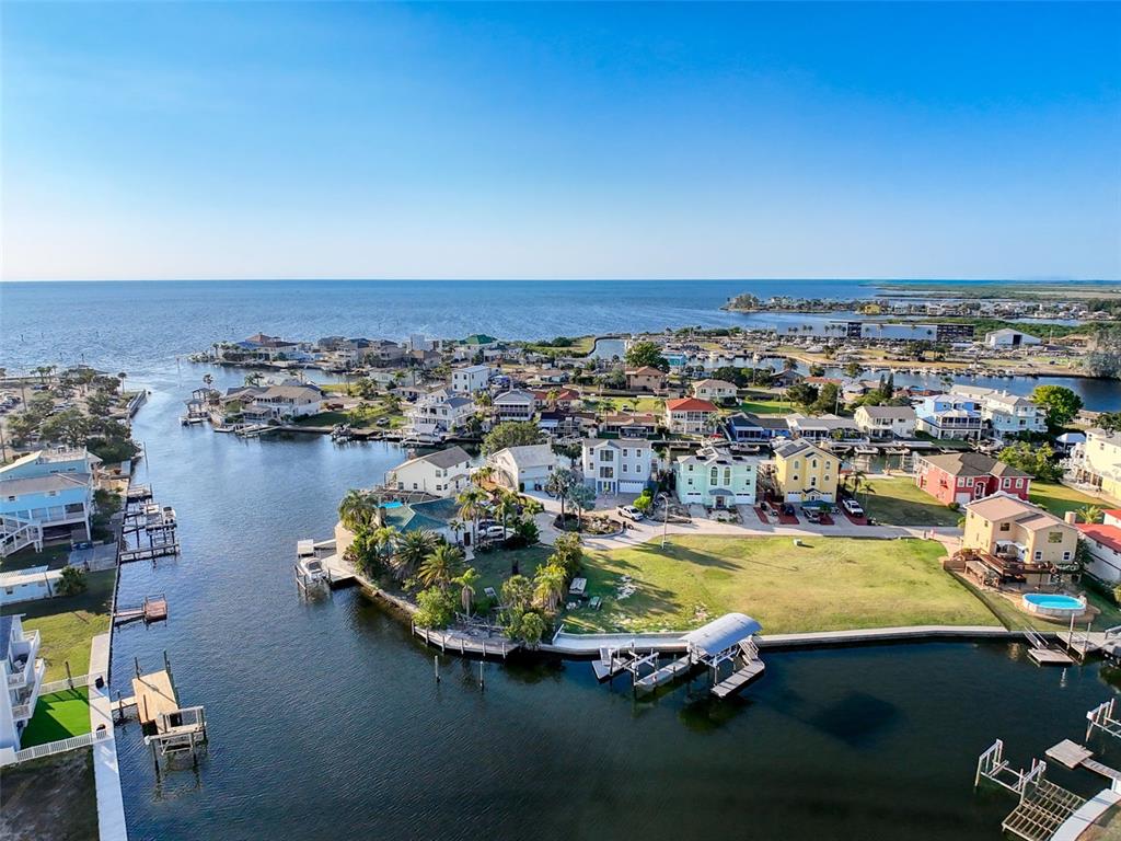 7 Louise Court Hudson, FL 34667 - Photo 22 of 52 an aerial view of a ocean with beach