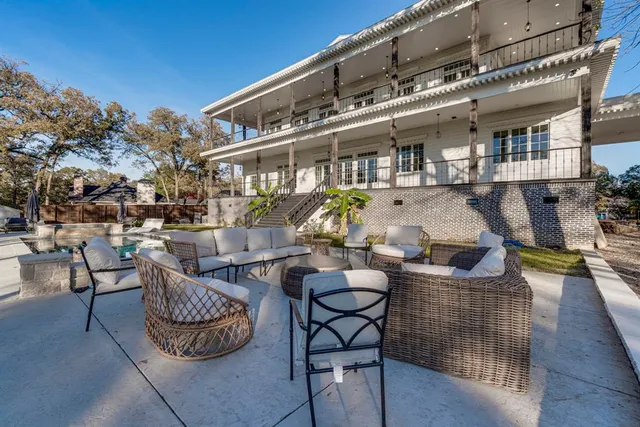 a view of house with patio outdoor seating