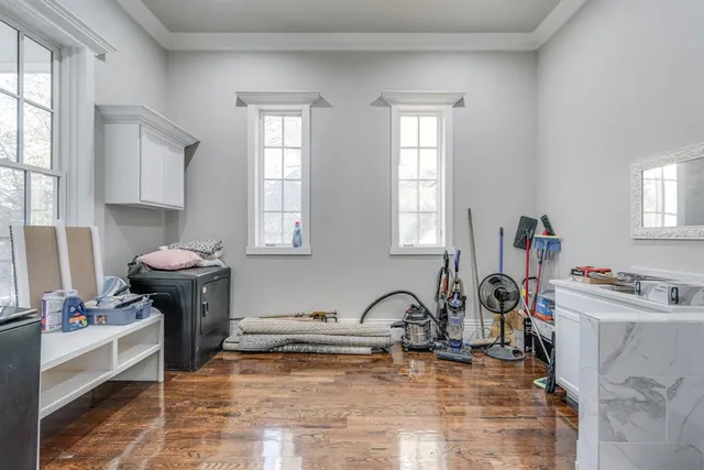 a kitchen with a sink and a stove top oven