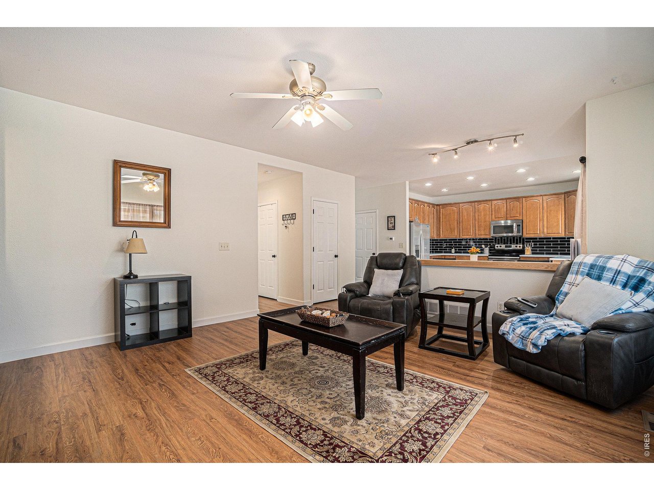 11226 Dover Street Firestone, CO 80504 - Photo 10 of 27 a living room with furniture and wooden floor