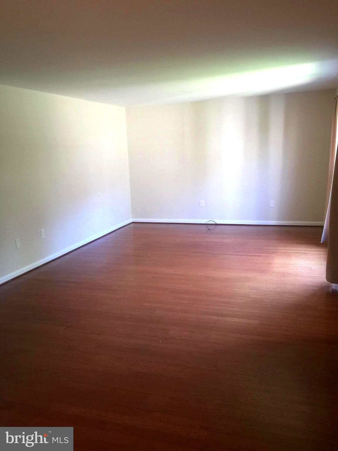 1605 West 7th Street Frederick, MD 21702 - Photo 4 of 19 an empty room with a space