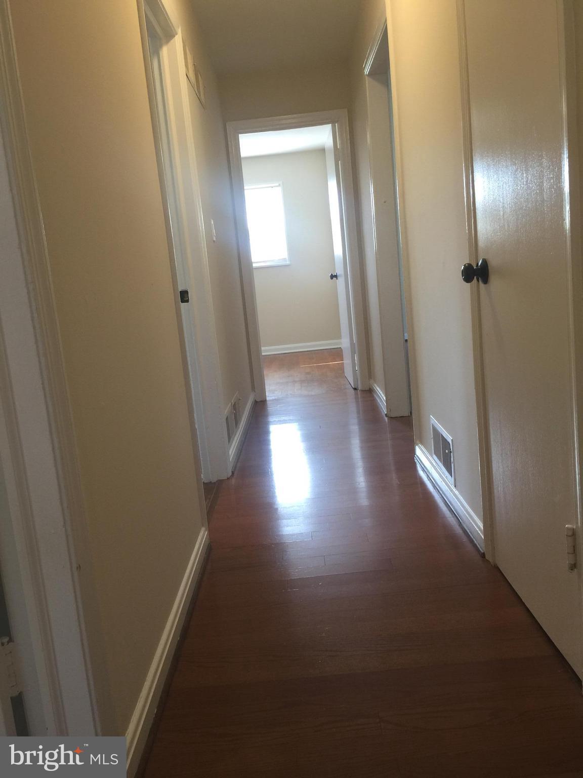 1605 West 7th Street Frederick, MD 21702 - Photo 8 of 19 a view of hallway with stairs