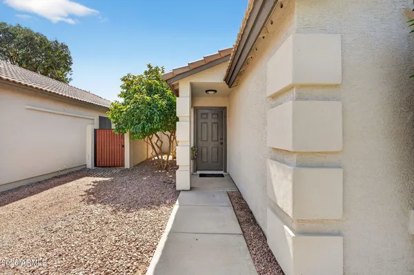 a front view of a house with a garage