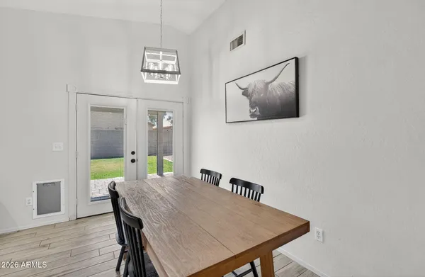 a view of a dining room with furniture