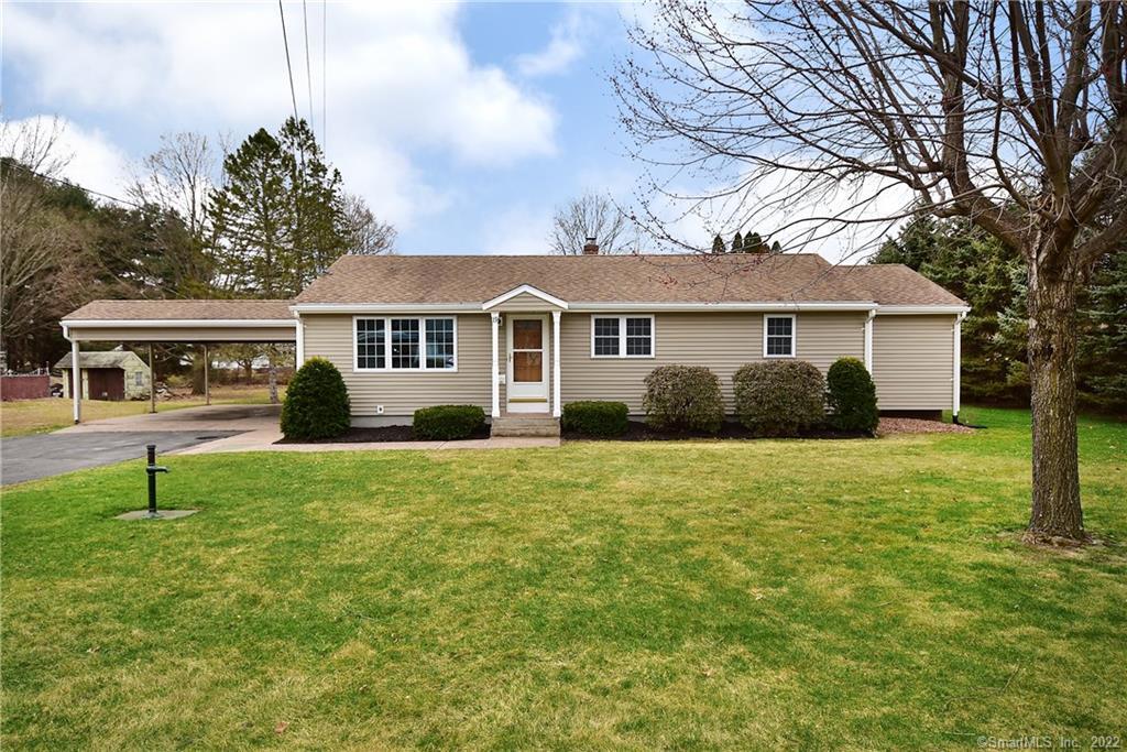 a house view with a garden space