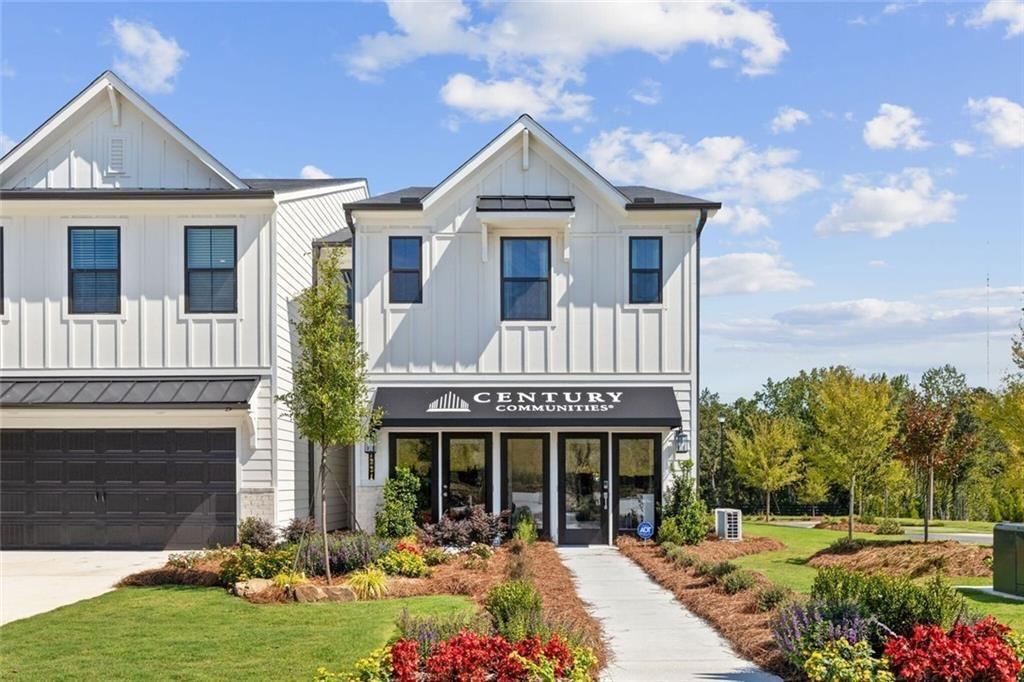 7357 Mulberry Trace Lane Hoschton, GA 30548 - Photo 14 of 19 a front view of a house with a yard